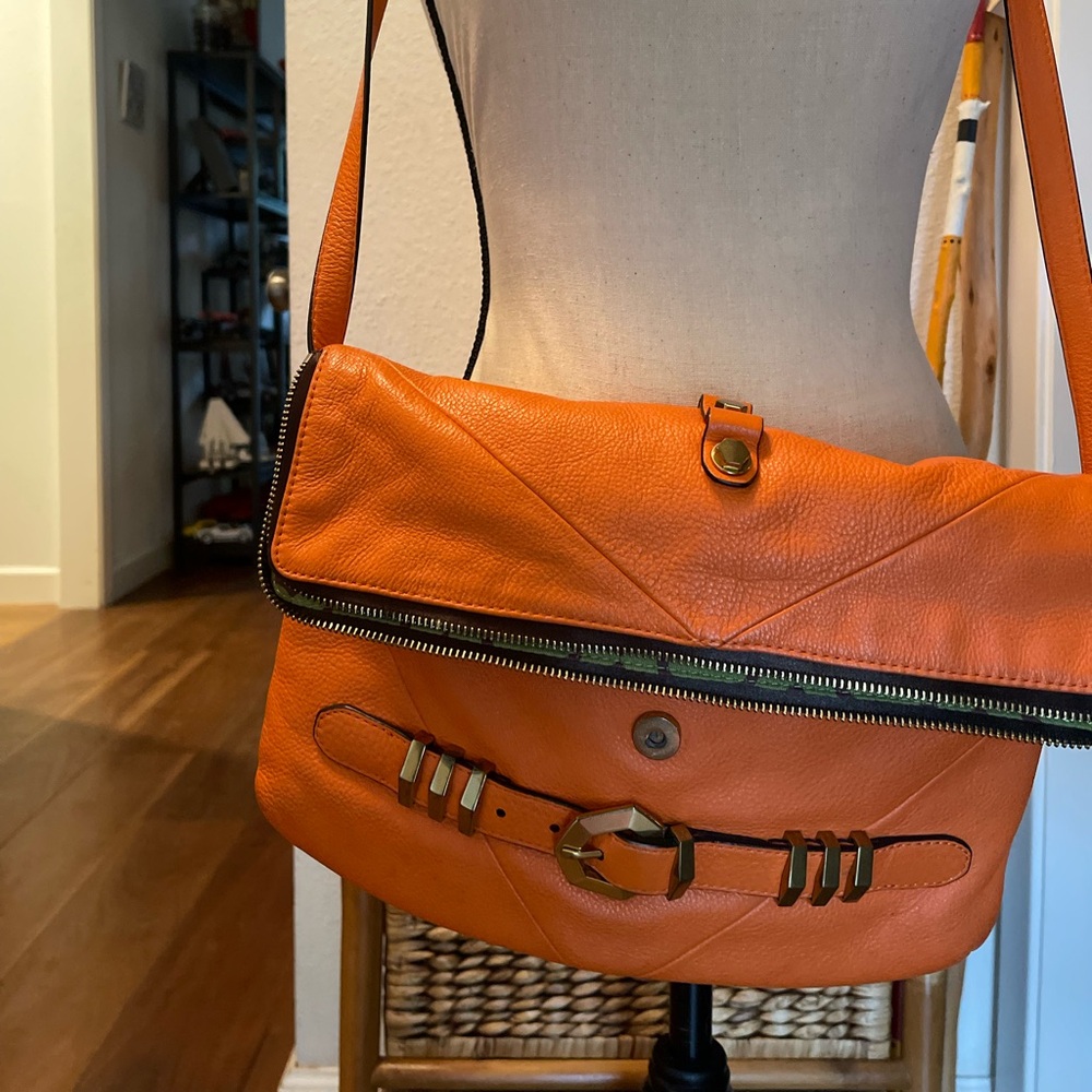 Orange leather folding purse